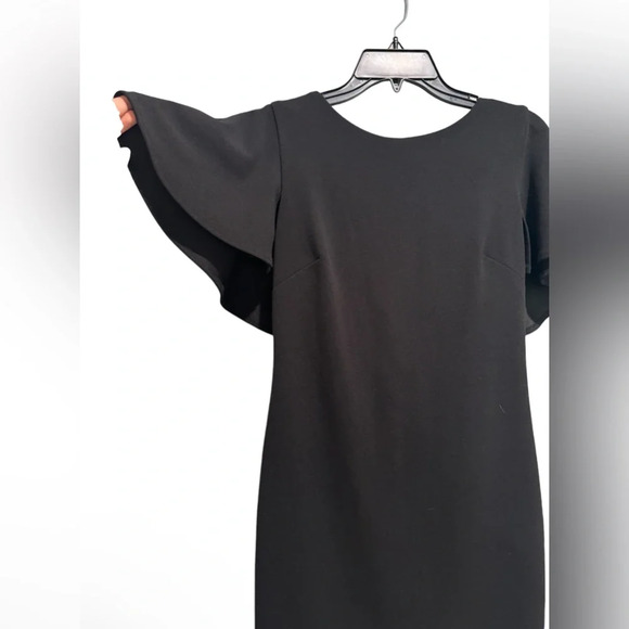 Calvin Klein Solid Flutter Sleeve V-Back
Cape Sheath Dress - Picture 3 of 7